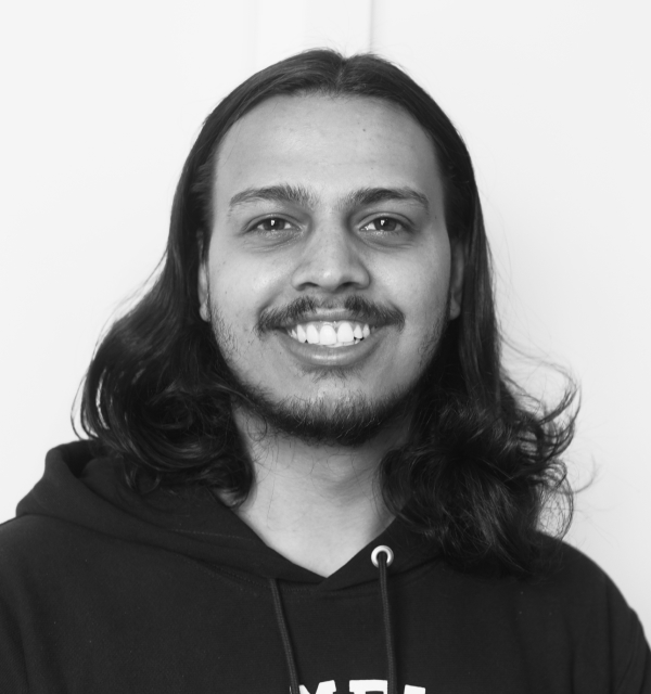 /headshots/manish.jpg
